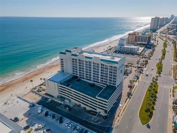 a view of a balcony with an ocean