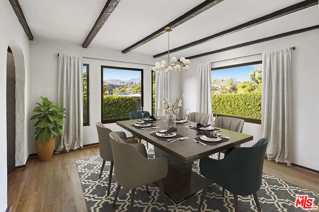 266 Mabery Road Santa Monica, CA 90402 - Photo 11 of 29 a dining room with furniture window and wooden floor