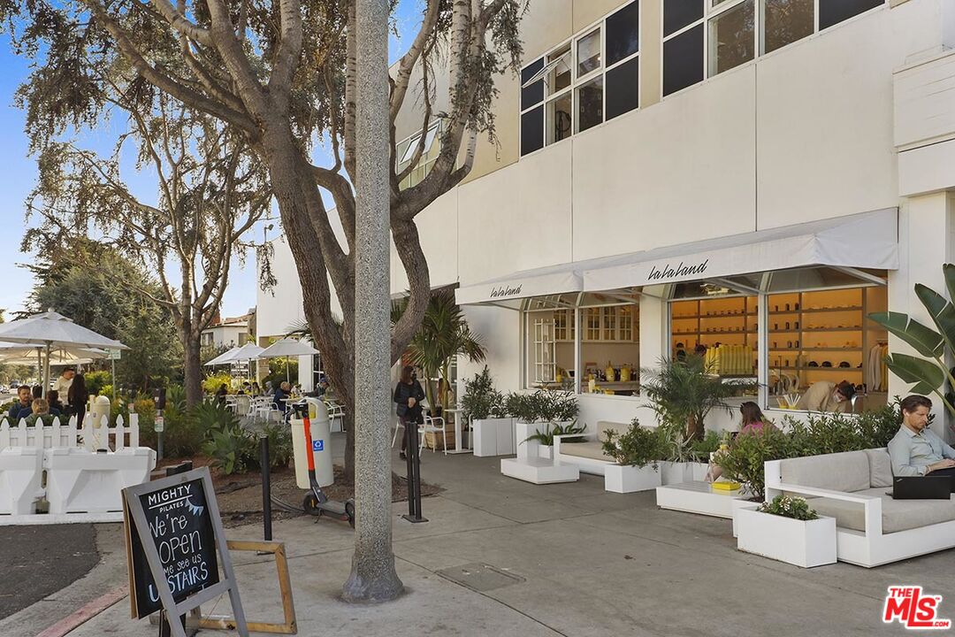 266 Mabery Road Santa Monica, CA 90402 - Photo 23 of 29 a view of a patio with couches and table and chairs and potted plants