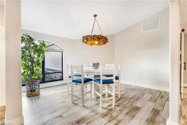 a view of a hallway with windows