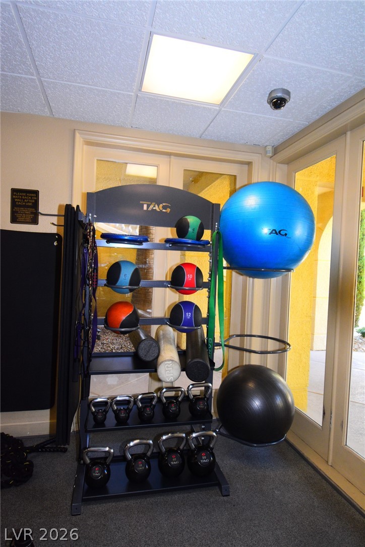 210 East Flamingo Road, Unit 137 Las Vegas, NV 89169 - Photo 25 of 32 Fitness room offering a selection of weights and exercise balls for a comprehensive workout.