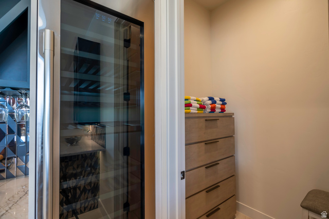 3606 South Cypress Road Hurricane, UT 84737 - Photo 60 of 69 Bathroom with a shower stall, wine cooler, and vanity
