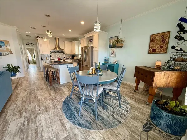 a view of a dining room with furniture