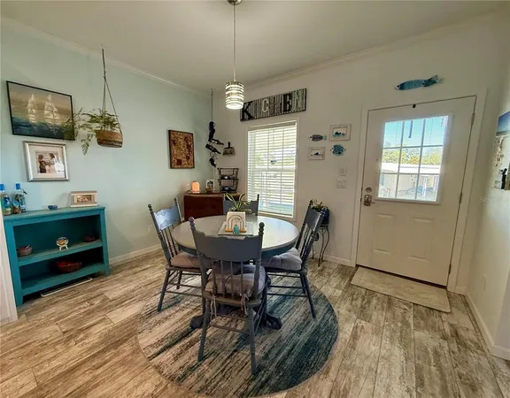 a kitchen with stainless steel appliances granite countertop sink stove top oven and cabinets