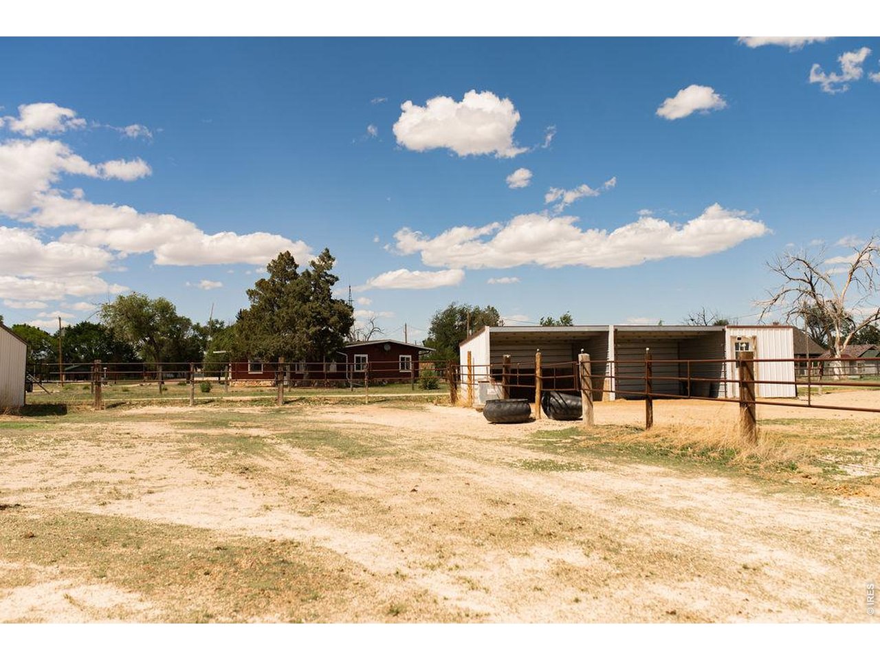 218 Pershing Street Grover, CO 80729 - Photo 42 of 50 10.5+/- Acres Fenced with Continuous Pipe and Metal Loafing Sheds, Tack Room, Automatic Waterer