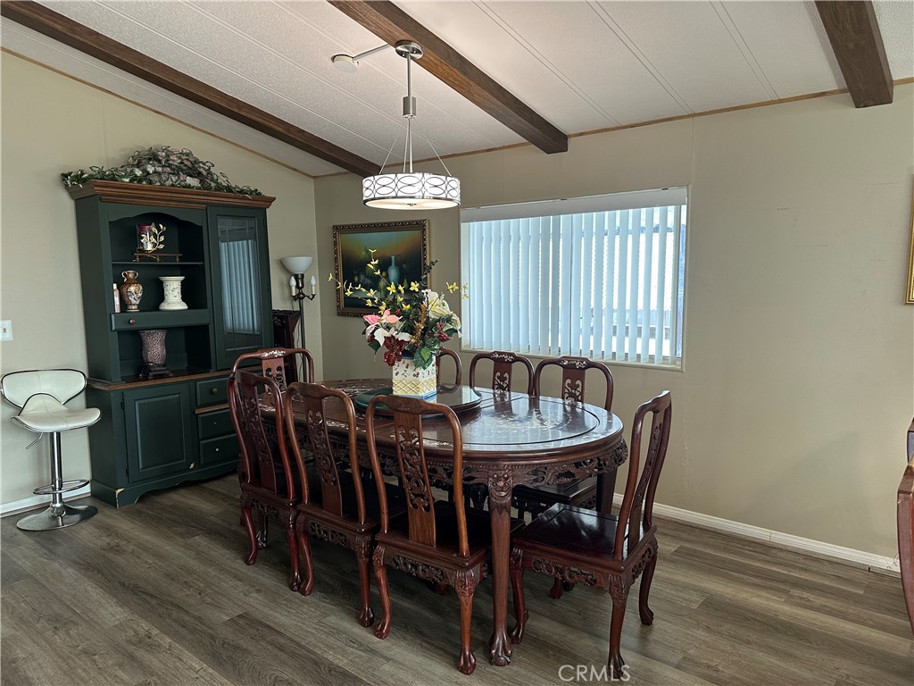 27701 Murrieta Road, Unit 268 Menifee, CA 92586 - Photo 2 of 24 a view of a dining room with furniture window and wooden floor