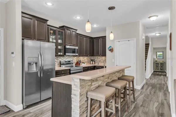 a view of a livingroom with furniture and window