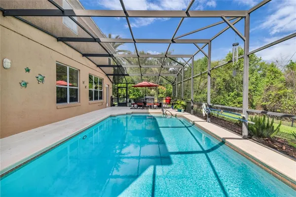 a living room with furniture and white walls