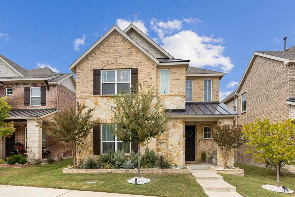 417 Pasco Road Garland, TX 75044 - Photo 1 of 1 a front view of a house with a yard