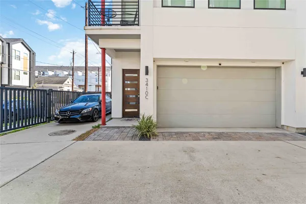 a view of parking and garage