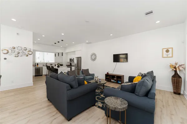 a living room with furniture and a couch
