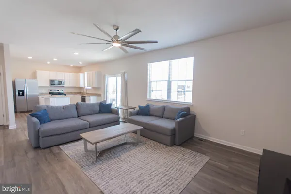 a view of a bathroom with wooden floor