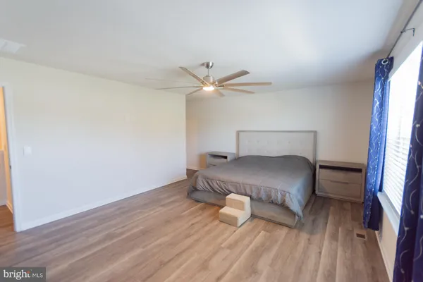 a room with a table and a window