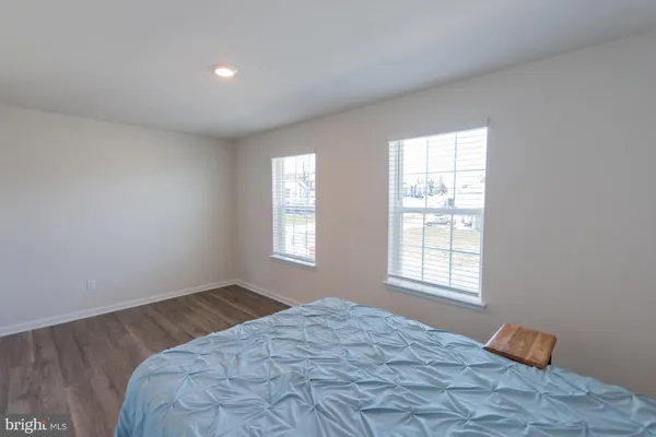 a bathroom with a sink toilet and mirror