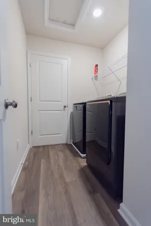 a view of a hallway with staircase