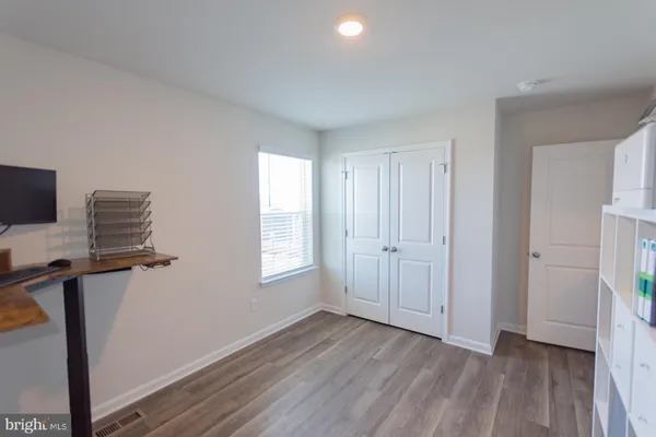 a view of a roof deck with couches