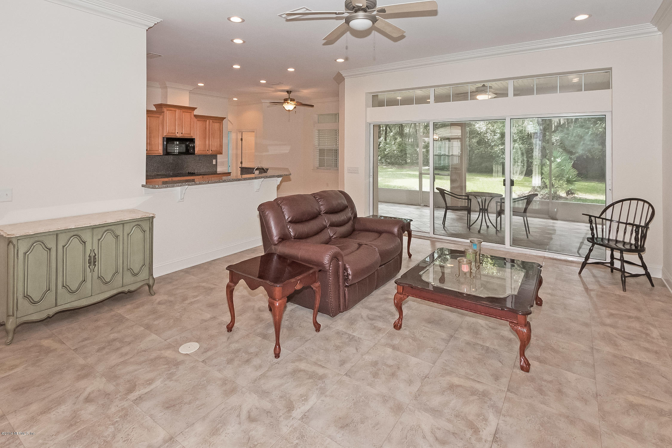 3377 Kings Road South St. Augustine, FL 32086 - Photo 6 of 33 a living room with furniture and a large window