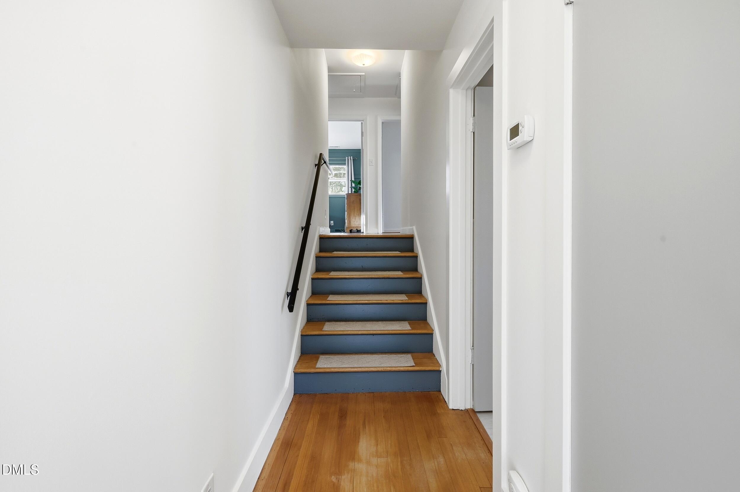 608 Hillhaven Terrace Roxboro, NC 27573 - Photo 12 of 31 a view of a hallway with wooden floor and entryway