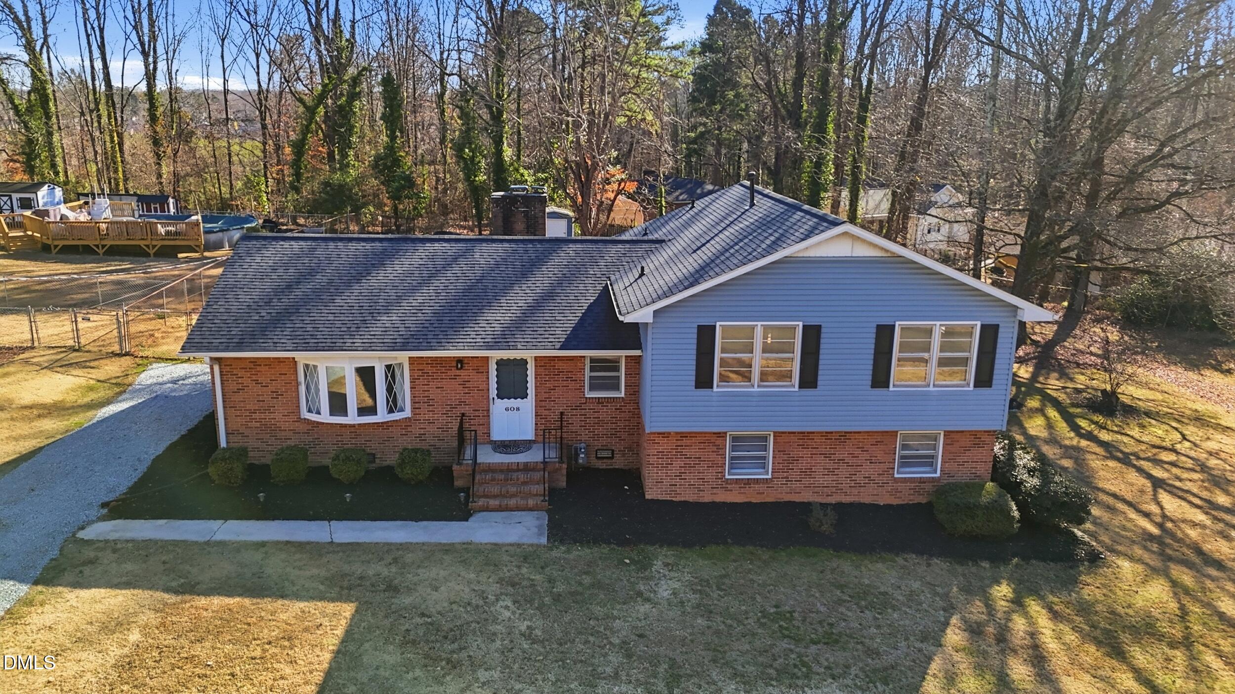 608 Hillhaven Terrace Roxboro, NC 27573 - Photo 24 of 31 a view of a house with a yard
