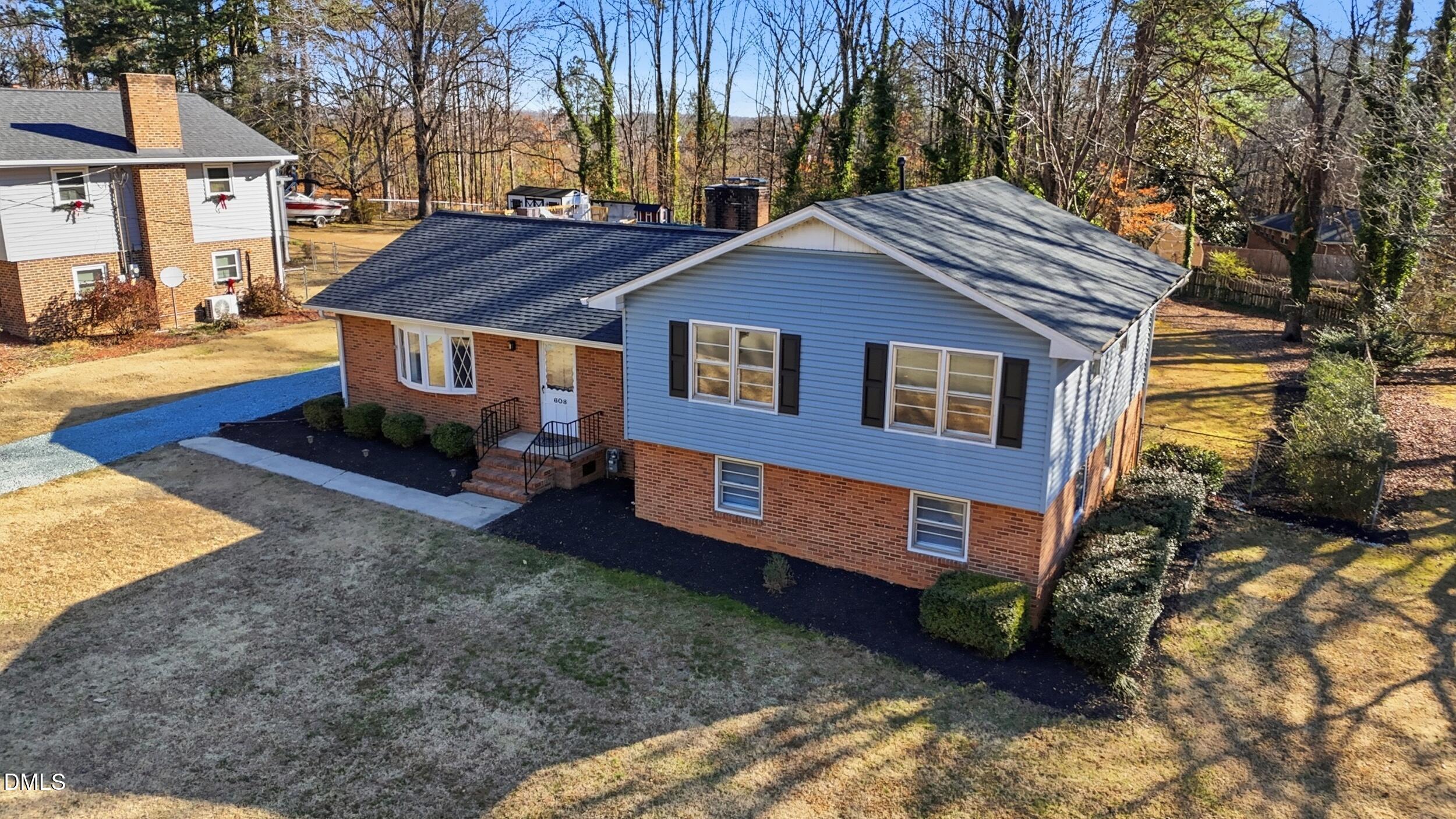 608 Hillhaven Terrace Roxboro, NC 27573 - Photo 25 of 31 a view of a house with a yard