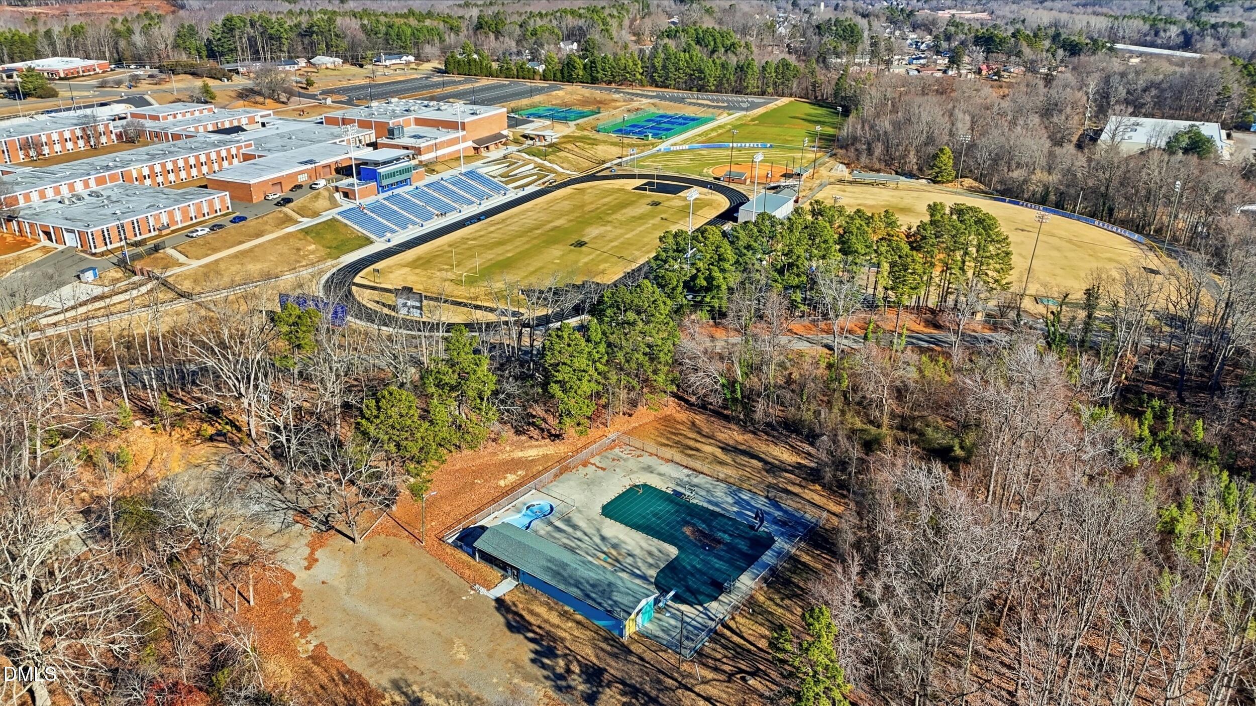 608 Hillhaven Terrace Roxboro, NC 27573 - Photo 28 of 31 an aerial view of a house with a yard and lake view
