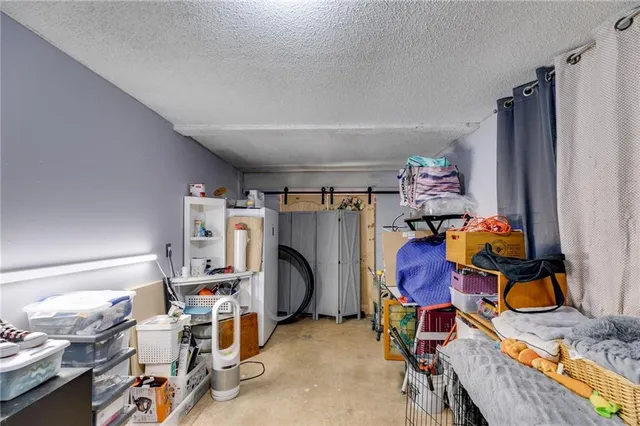 a view of storage and utility room