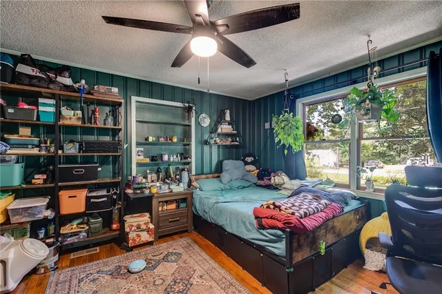 a outdoor living space with furniture and a bookshelf