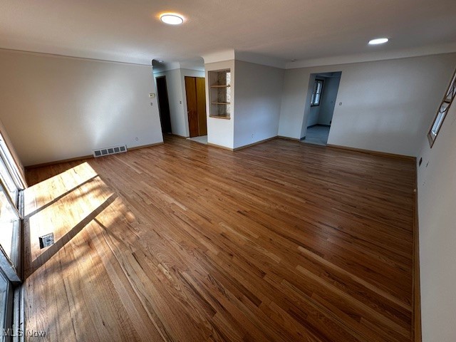 8375 Royal Ridge Drive Parma, OH 44129 - Photo 12 of 12 Empty room featuring wood finished floors and crown molding