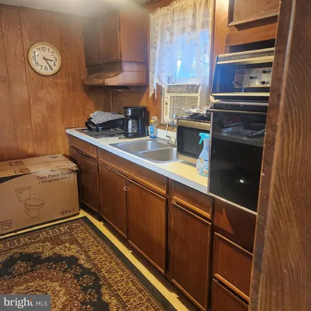 a room with storage and pool table