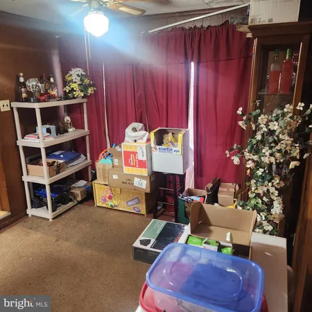 a room with lots of different colored cloths