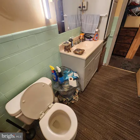 a view of room with furniture and closet