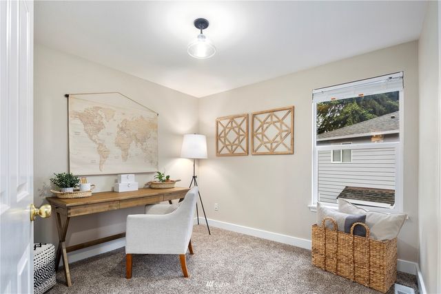a bathroom with a sink toilet a mirror and shower