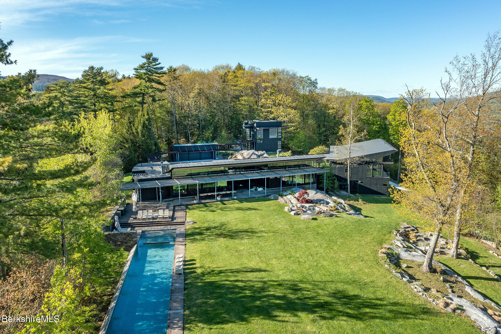 a view of a swimming pool with a garden