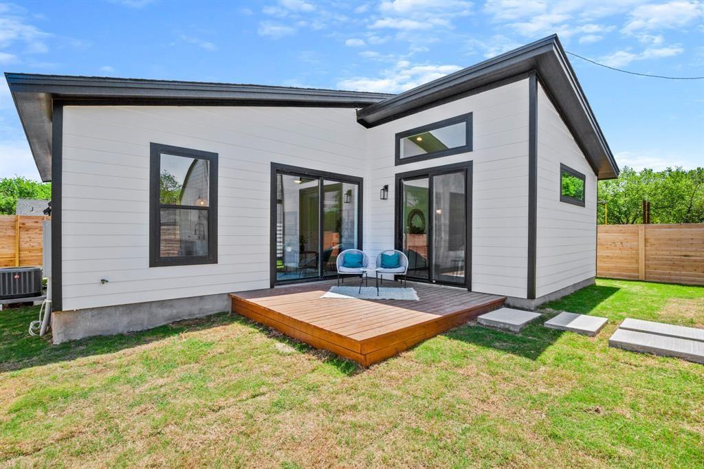 1606 Harvey Street, Unit 2 Austin, TX 78702 - Photo 18 of 22 Modern white siding exterior with a dark trim accent