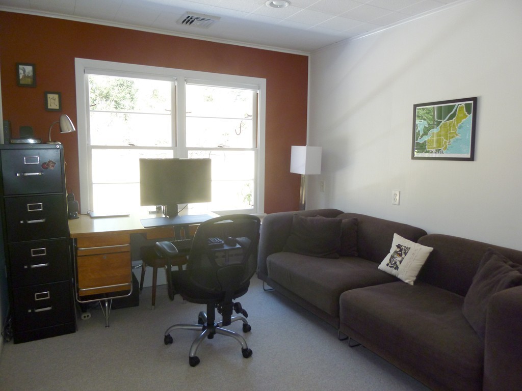 625 Westhampton Road Northampton, MA 01062 - Photo 12 of 30 a livingroom with workspace couch and a window
