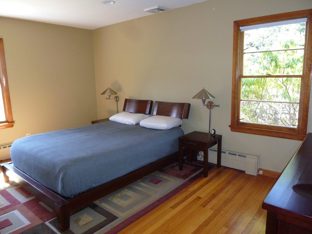 625 Westhampton Road Northampton, MA 01062 - Photo 14 of 30 a bedroom with a bed and a window