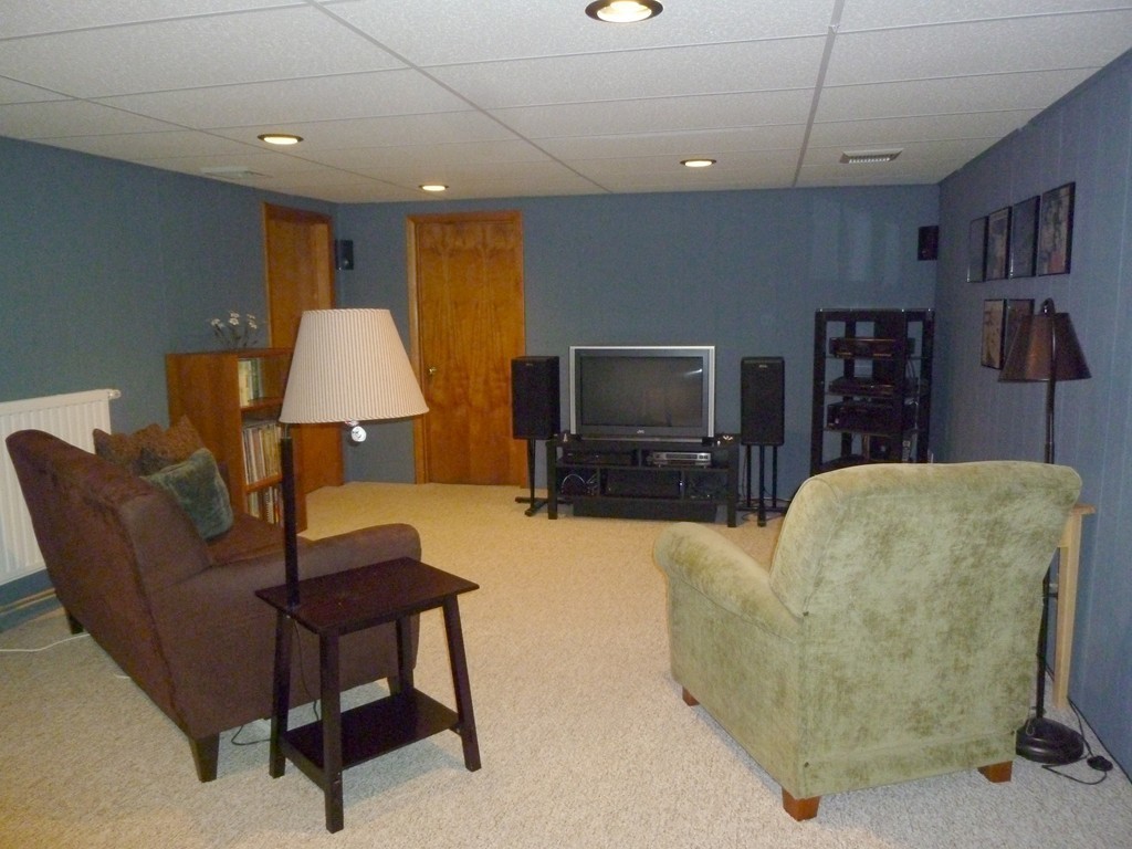 625 Westhampton Road Northampton, MA 01062 - Photo 18 of 30 a living room with furniture and a flat screen tv