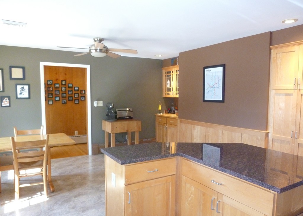 625 Westhampton Road Northampton, MA 01062 - Photo 4 of 30 a kitchen with stainless steel appliances granite countertop a sink and a refrigerator