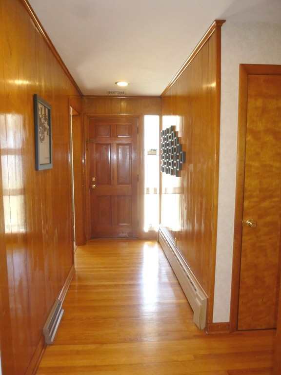 625 Westhampton Road Northampton, MA 01062 - Photo 6 of 30 a view of hallway with windows and wooden floor