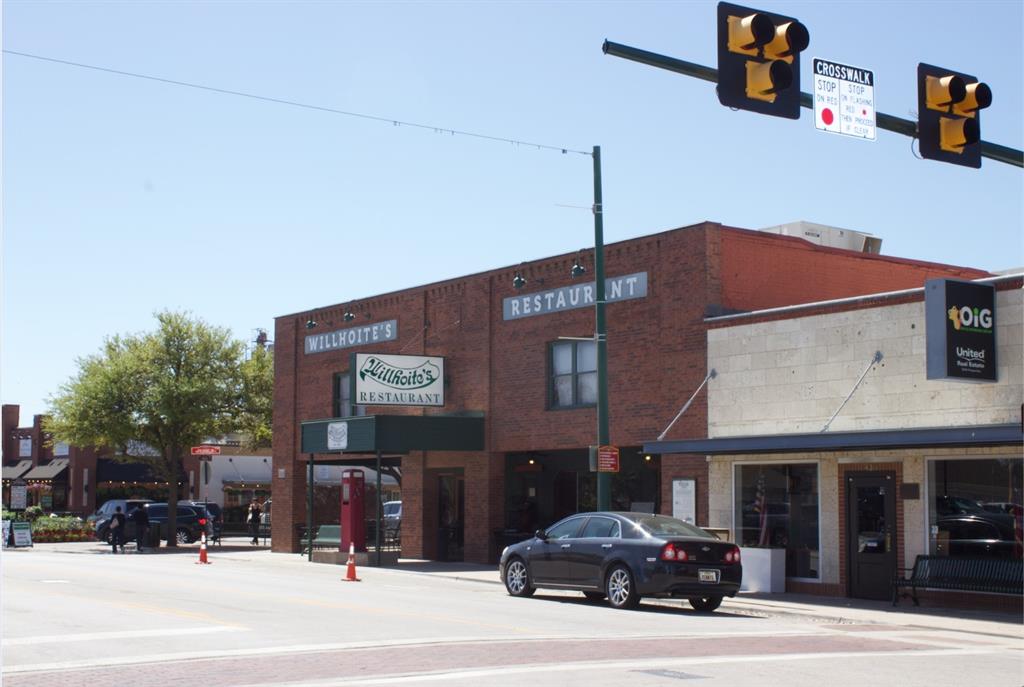 422 Smith Street Grapevine, TX 76051 - Photo 4 of 9 a car parked in front of a building