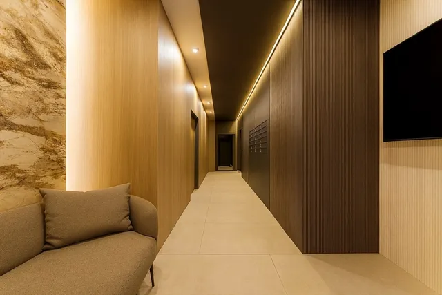 a living room with a couch and a flat screen tv