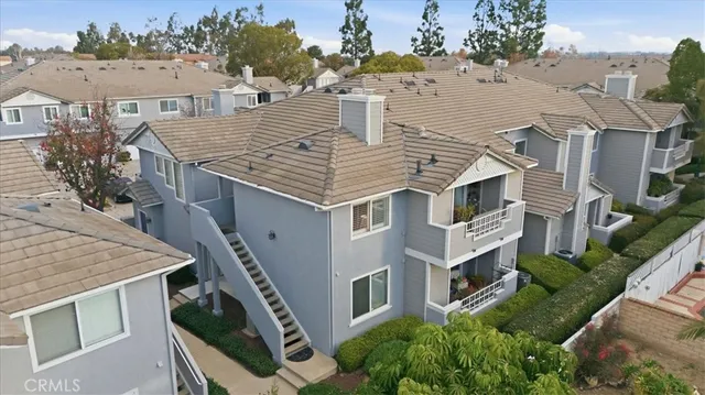 an aerial view of a city with lots of residential buildings