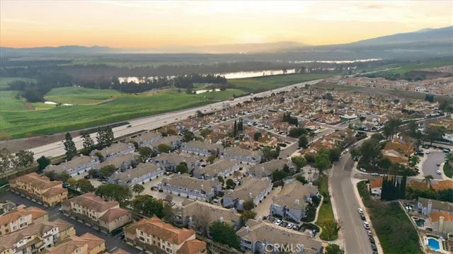 an aerial view of a house with a garden