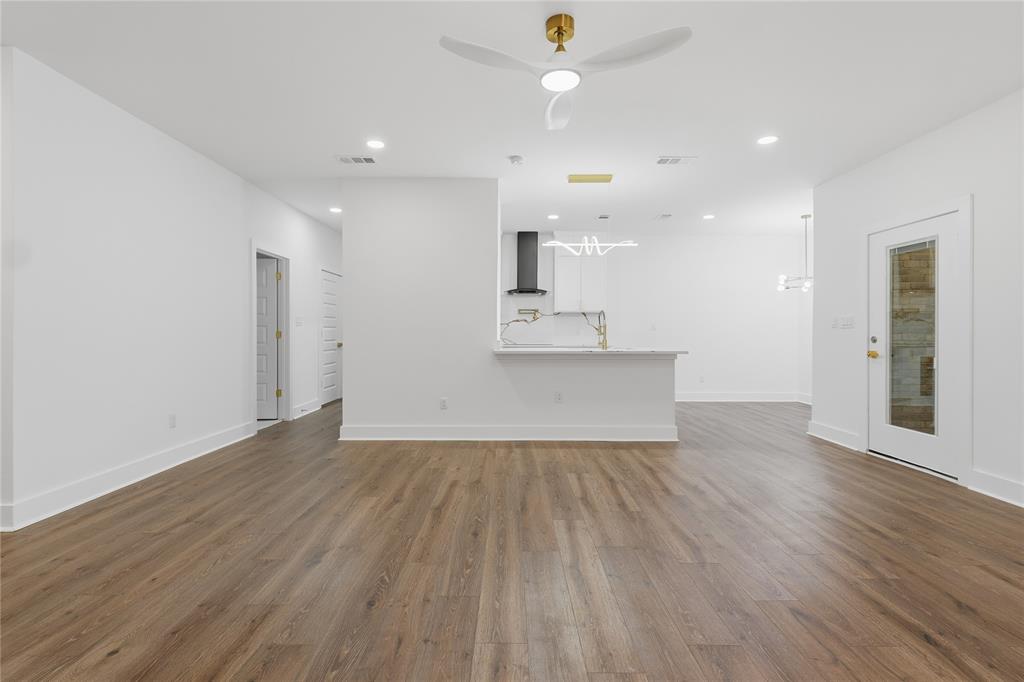 130 Cedar Elm Road Trinidad, TX 75163 - Photo 3 of 27 Open-concept living area featuring wood-finish flooring, recessed lighting, and a modern ceiling fan