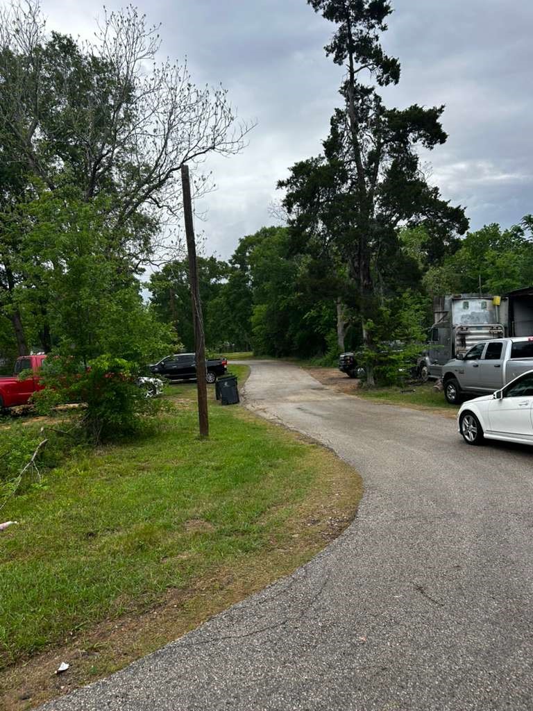 939 Avenue J Place Conroe, TX 77301 - Photo 5 of 8 a view of a park with a slide