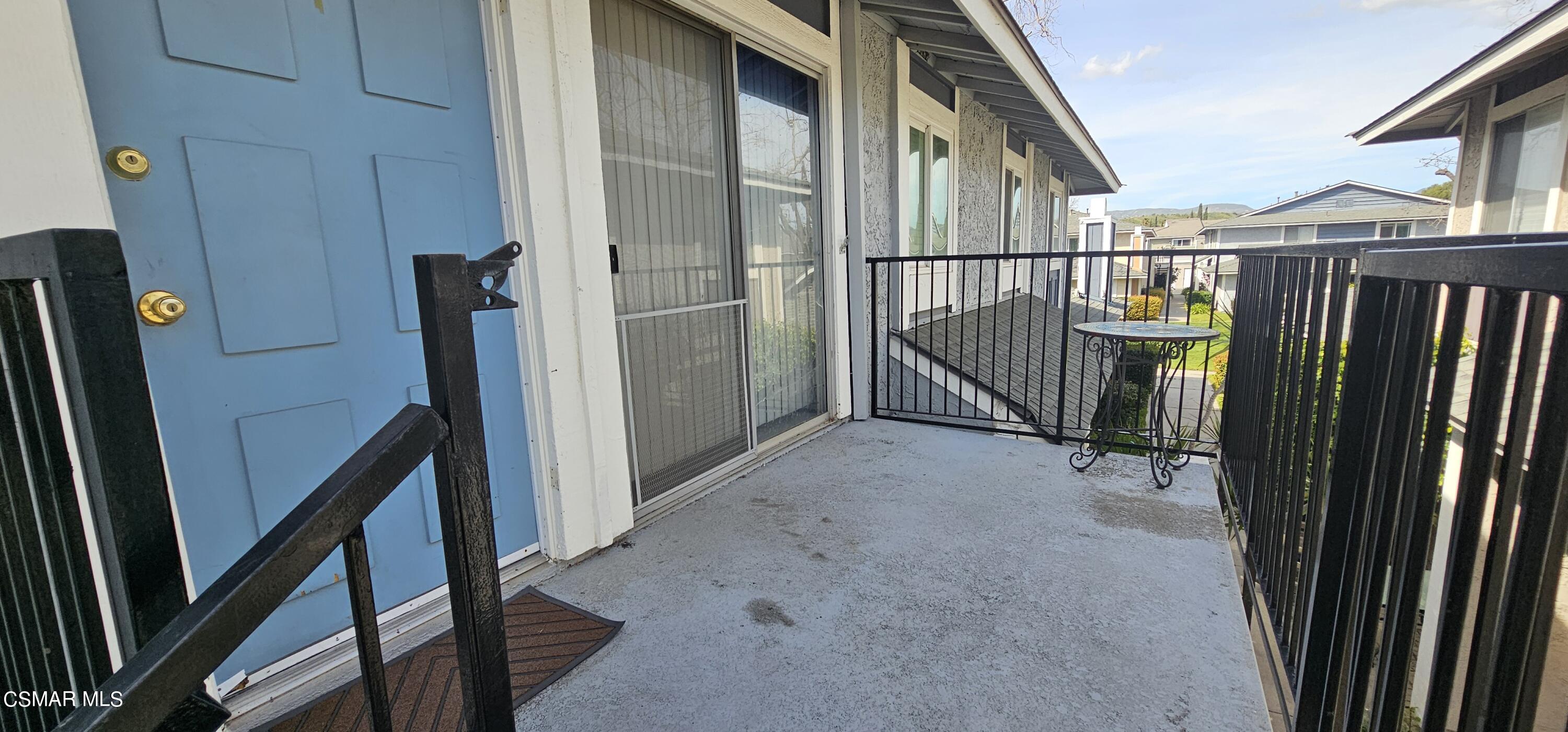 536 Spring Road, Unit 100 Moorpark, CA 93021 - Photo 2 of 3 a view of staircase with railing and white walls