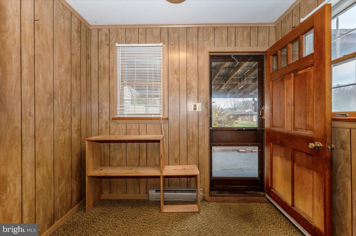 10622 National Pike Big Pool, MD 21711 - Photo 11 of 60 a room that has a bed and a window