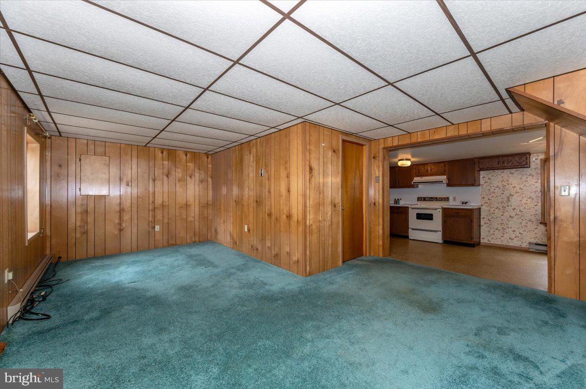 10622 National Pike Big Pool, MD 21711 - Photo 19 of 60 a view of a livingroom with a fireplace