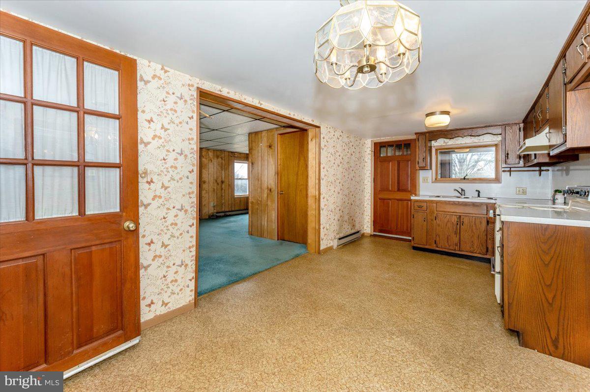 10622 National Pike Big Pool, MD 21711 - Photo 2 of 60 a view of a big room with closet and windows