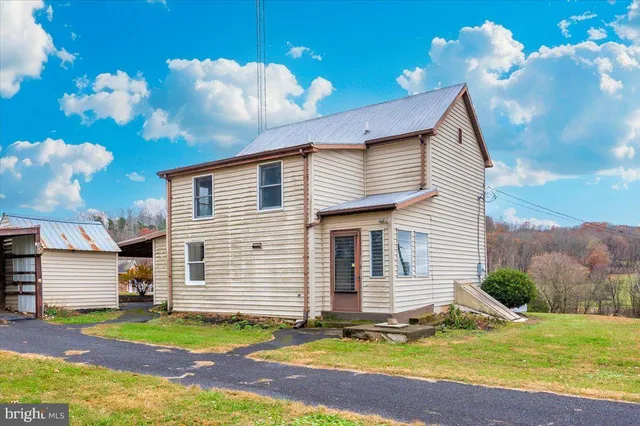 a small house in middle of the forest